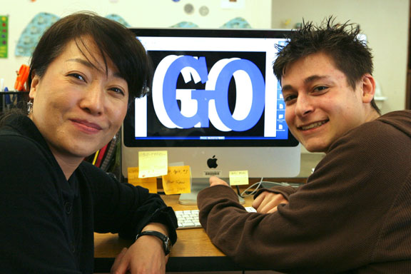 Palisades High animation instructor Lindsey Son in her computer lab with Mr. Palisades himself, Christopher Alexakis.